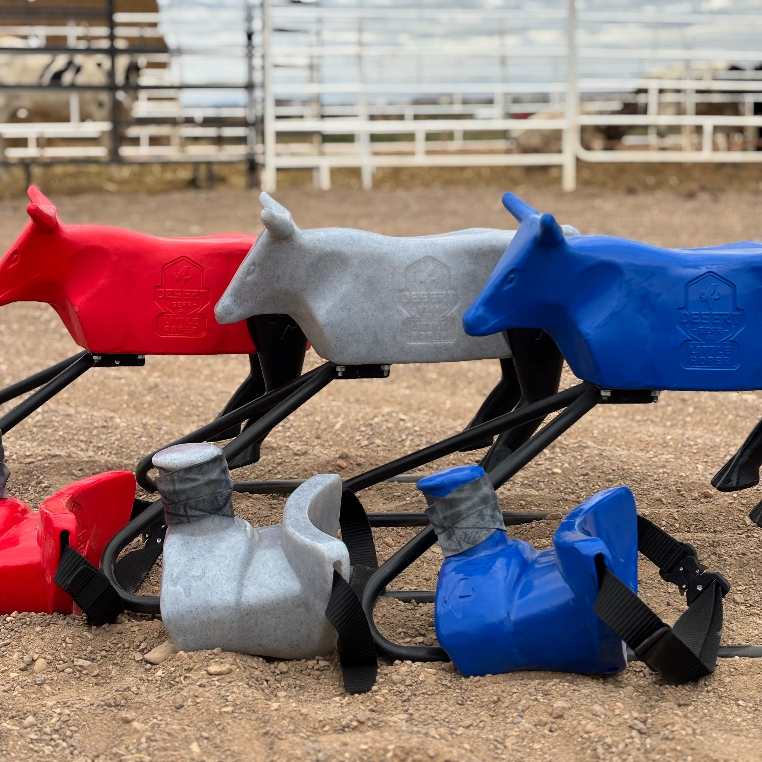 red white & blue collection of roping dummies